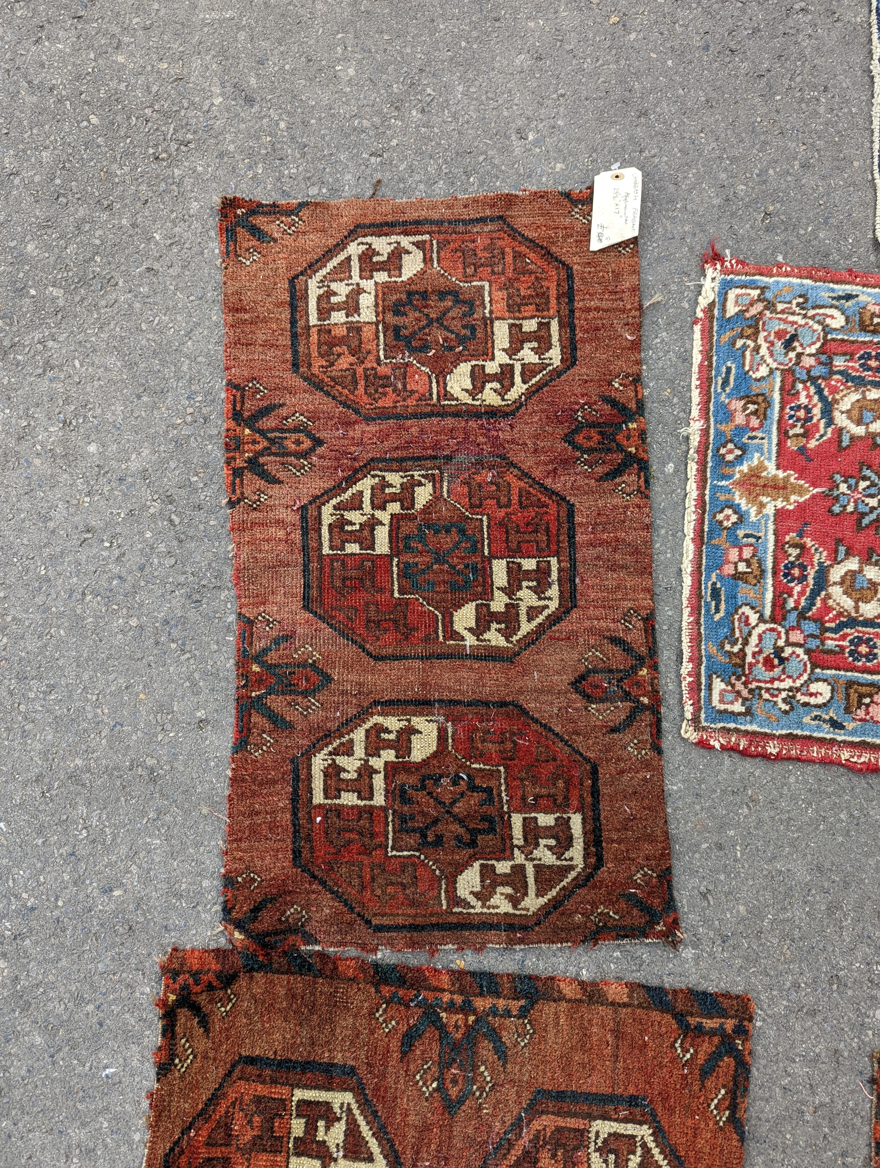 Nine Afghan, Persian and Chinese rug fragments.